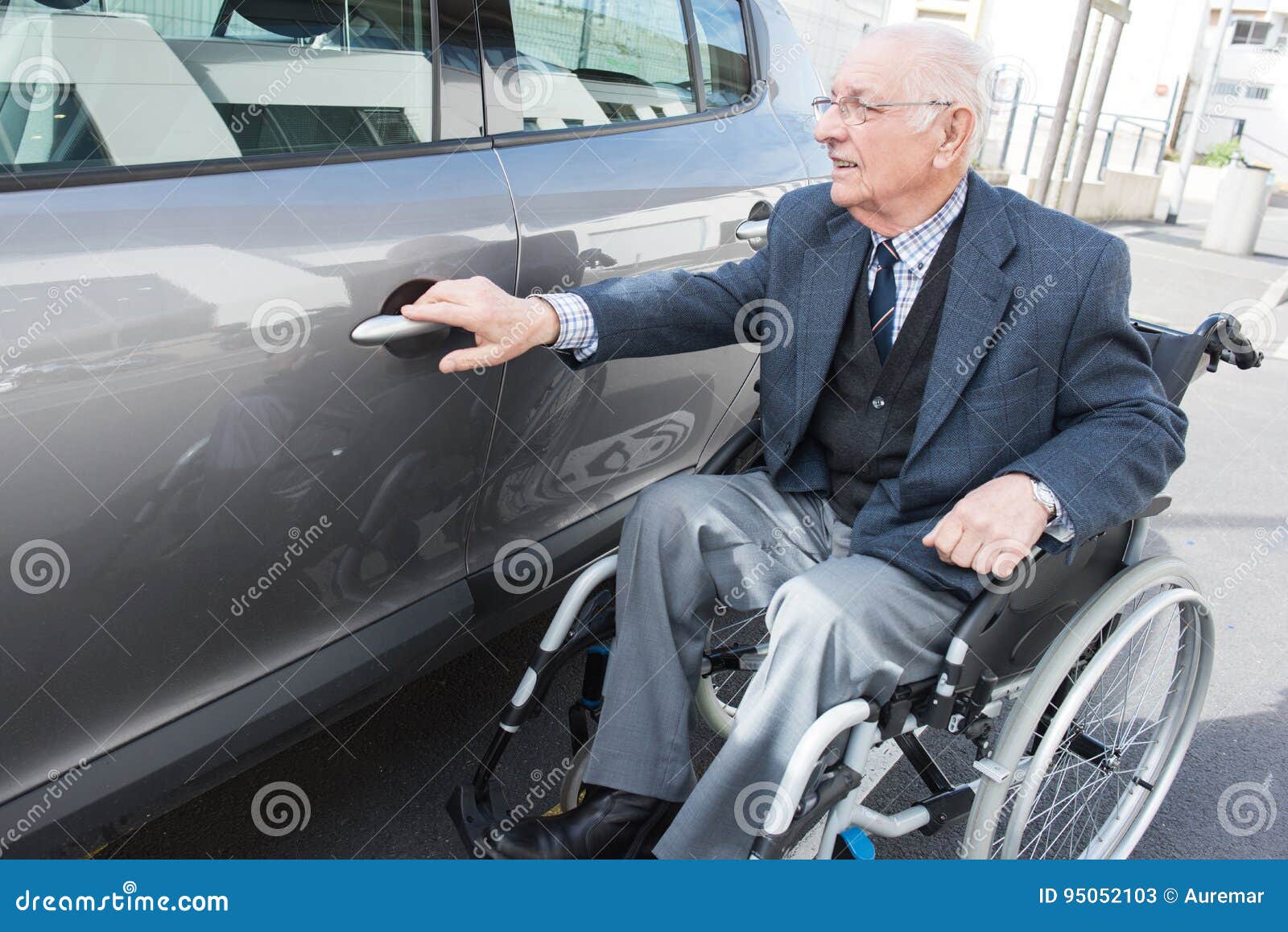 old-man-wheelchair-next-to-car-his-95052103.jpg