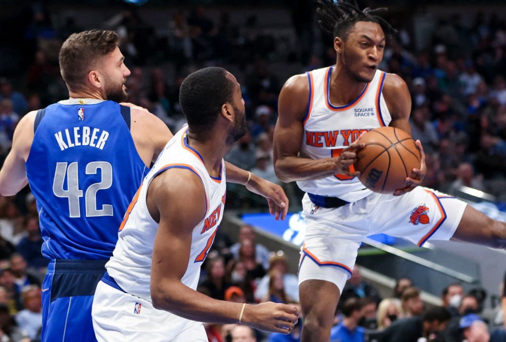 Immanuel Quickley grabs the ball away from Dallas' Maxi Kleber during the first half of the Knicks' win.