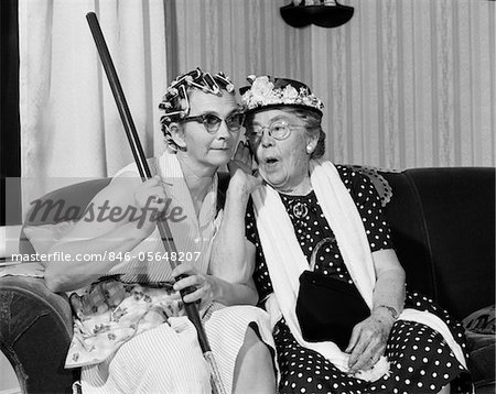 846-05648207em-1950s-1960s-TWO-ELDERLY-WOMEN-CHARACTERS-GOSSIPING-ONE-WOMAN-WITH.jpg
