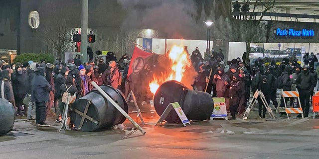 Antifa activists set fires at an intersection near Frost Park in Tacoma, Washington, in 2021. A new GOP bill would set up a commission to study Antifa violence.