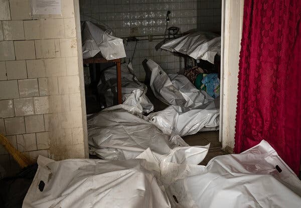 The bodies of fallen soldiers at a frontline morgue in Donbas.